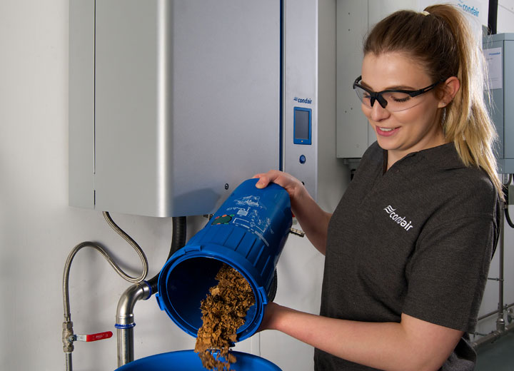 Scale falls into the scale collector tank. 